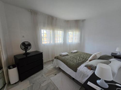 En eller flere senge i et værelse på Casa 13