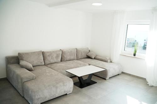 Posezení v ubytování Ferienhaus Zentral, nahe Legoland und Stadtmitte, Flussblick - Perfekt für Familien, Geschäftstreffen, Monteure und mehr!