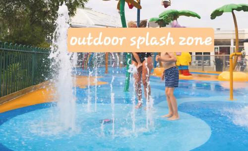 a water park with children playing in the fountain at Caravan to Hire - CalaGran Fleetwood Blackpool in Fleetwood