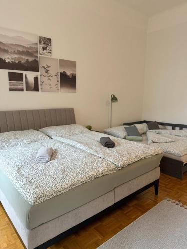 a bedroom with a bed and a couch at Ferienwohnung Klapothek in Leutschach
