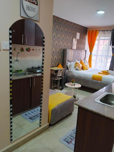 Postel nebo postele na pokoji v ubytování Budget bliss bnb ruaka1