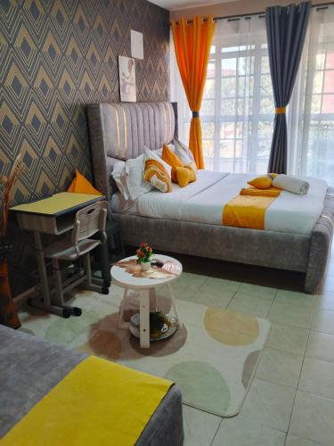 Postel nebo postele na pokoji v ubytování Budget bliss bnb ruaka1