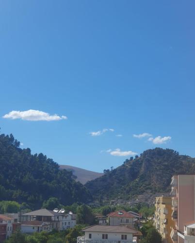 a view of a city with houses and mountains at KC Apartments 3 in Berat