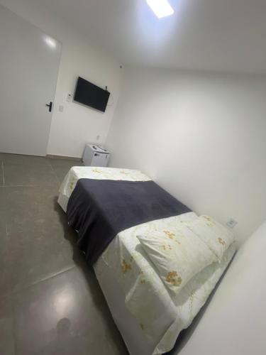 Ένα ή περισσότερα κρεβάτια σε δωμάτιο στο Manaira Suite 01