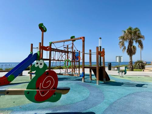 Sunset Beach Apartment - Playa del Cura, 10 meters to Beach, Sea View, Centrally Located, Los Locos