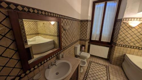 Ένα μπάνιο στο Crespi Apartments Six