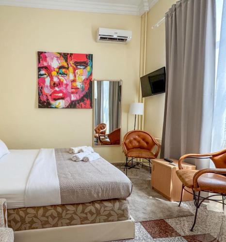 Ένα ή περισσότερα κρεβάτια σε δωμάτιο στο Vila club 011