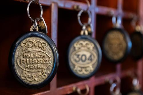 a row of pocket watches on a rack at Hotel Russo Palace in Venice-Lido