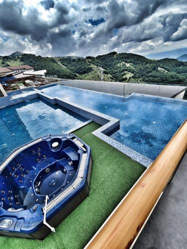 a large swimming pool on top of a building at Milmari S70 Kopaonik in Kopaonik
