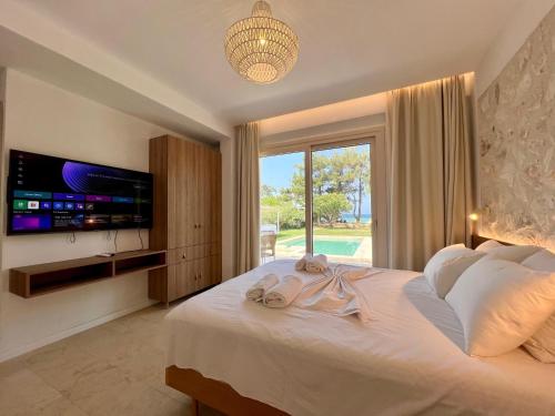 Gallery image of FOFO Platana Beachfront Villa in Skala Rachoniou