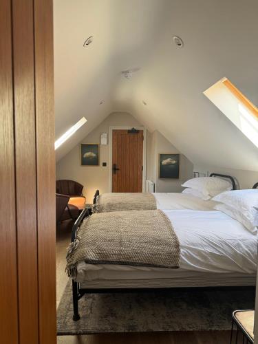 Una cama o camas en una habitación de Stay at Plattens