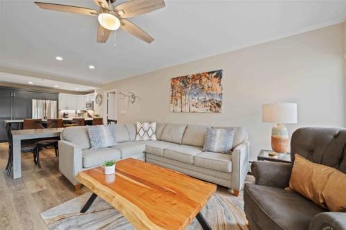 a living room with a couch and a table at St James Place 216 in Beaver Creek
