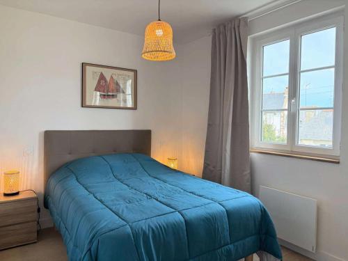 Postel nebo postele na pokoji v ubytování Résidence L09-tregastel - Vacances à quelques pas de la mer et des commerces MAE-4871