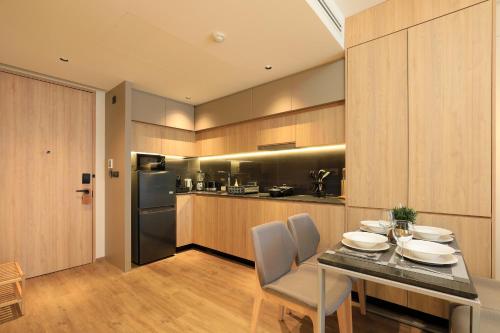 Η κουζίνα ή μικρή κουζίνα στο 1bdr New Apartment near Layan Beach