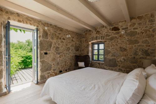 Postel nebo postele na pokoji v ubytování Holiday Home Stancija Srem