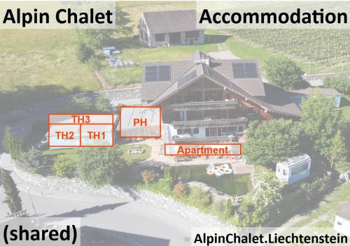 an aerial view of a house with signs on it at Alpine Chalet L iechtenstein in Eschen