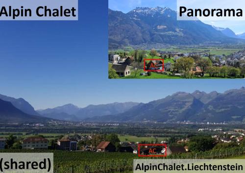 a town in a valley with a mountain range at Alpine Chalet L iechtenstein in Eschen