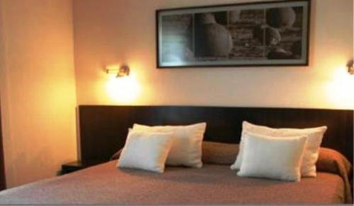 Кровать или кровати в номере Gran Hotel Provincial