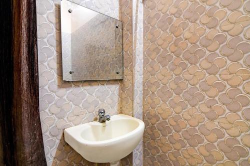 Koupelna v ubytování Hotel O Padmavati Projects Pvt Ltd Near Netaji Subhash Chandra Bose International Airport
