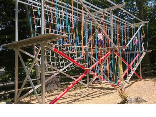 a play structure with people on it at Luxury Jiminy Ski On Off Village Ctr Condo Sleeps4 in Hancock