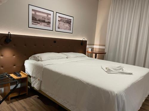 Hotel Neloにあるベッド