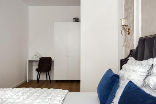 Ένα ή περισσότερα κρεβάτια σε δωμάτιο στο Sika Trezor Apartment Arad