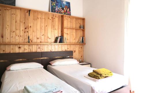 Postel nebo postele na pokoji v ubytování La Casa Nella Roccia