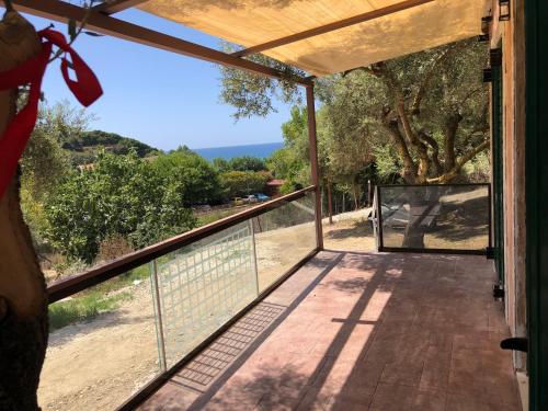 a view from the balcony of a house at Villa MaryElen Marathias beach in Corfu Town