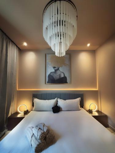 Ένα ή περισσότερα κρεβάτια σε δωμάτιο στο Free Parking 2 Bedroom The Comfy Haven