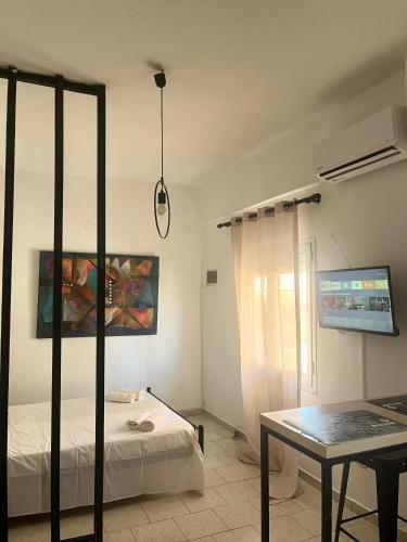 Katil atau katil-katil dalam bilik di Bright studio-near the sea