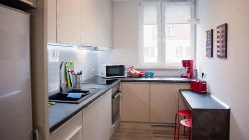 Majoituspaikan Apartament Piano keittiö tai keittotila