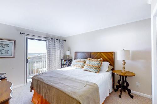 Katil atau katil-katil dalam bilik di Dunescape Villas 245