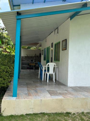 a patio with two chairs and a table at Marialuna in Utica