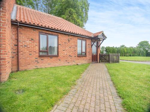 En have udenfor Clover Cottage - W40835