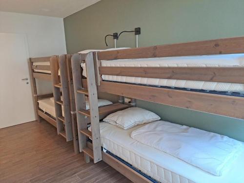 Una cama o camas en una habitación de Emma Top 1 XL