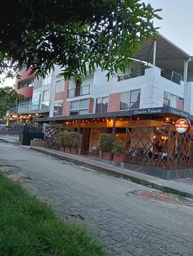 a building with a restaurant on the side of a street at Denier House II in Ibagué