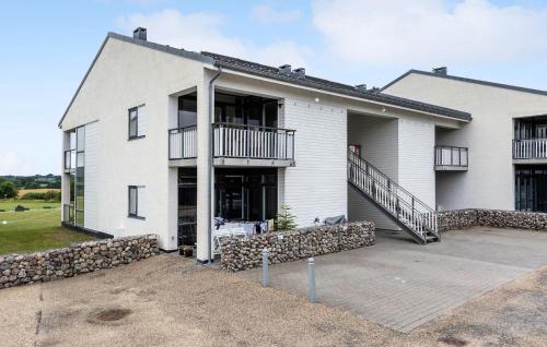 a large white house with a large driveway at Stunning Home In Gråsten With Sauna in Gråsten
