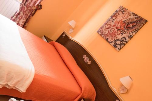 B&B Via Romaにあるベッド