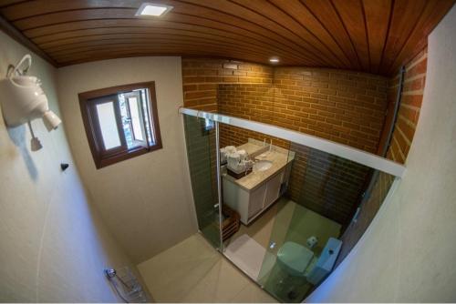 Una cocina o zona de cocina en Cactus Chalés & Cabanas em lumiar