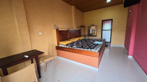 Η κουζίνα ή μικρή κουζίνα στο Hotel Janara