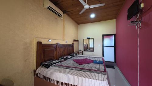 Ένα ή περισσότερα κρεβάτια σε δωμάτιο στο Hotel Janara