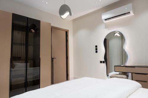 Ένα ή περισσότερα κρεβάτια σε δωμάτιο στο سمو 101 ــ OrbitNet 3 JED