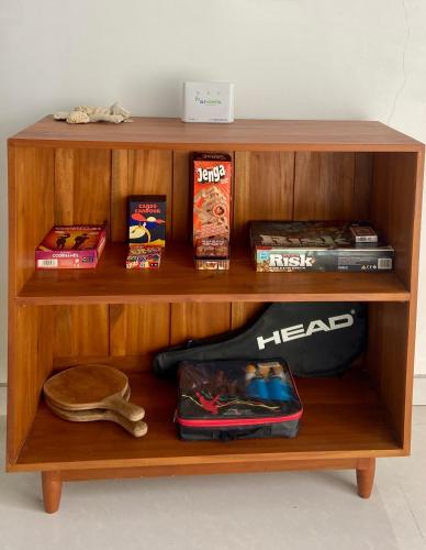 a wooden shelf with various items on it at Beachside Stay Steps From Mawella Bay, Tangalle #thisisnotahotel in Mawella