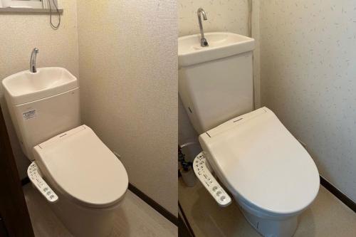 a bathroom with a toilet and a sink at Petit Hotel Koizumi - Vacation STAY 85672v in Lake Toya