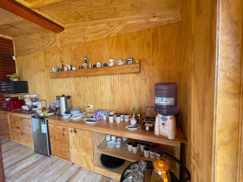 Kuchyň nebo kuchyňský kout v ubytování Hostal Doña Tamy