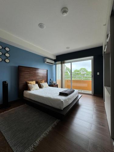Letto o letti in una camera di Cozy apartment near to Costa Rica Airport