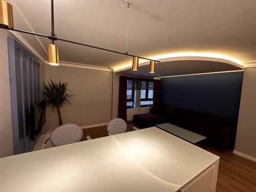 a meeting room with a white table and chairs at OTTO Tunalı Houses in Ankara