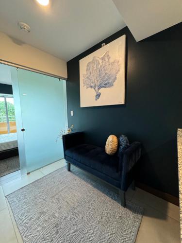 Area soggiorno di Cozy apartment near to Costa Rica Airport