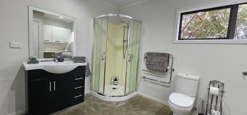 Ένα μπάνιο στο Tamahere Hideaway