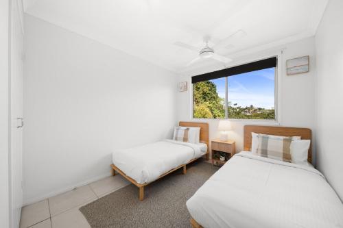 Caloundra Beach Break - 3BD Family Homeにあるベッド